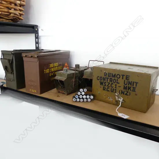 2 AMMO CASES, 3 LANTERNS, REMOTE CONTROL UNIT, BULLETS