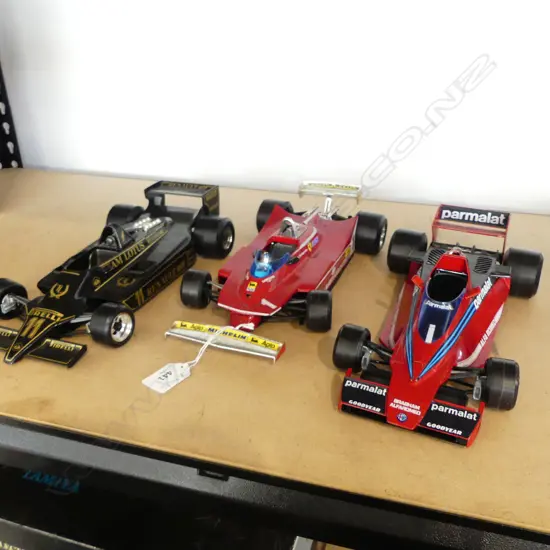 3 BURAGO 1:14 RACING CARS; FERRARI 312 T5, LOTUS RENAULT ELF, BRABHAM PARMALAT ALFA ROMEO BT46