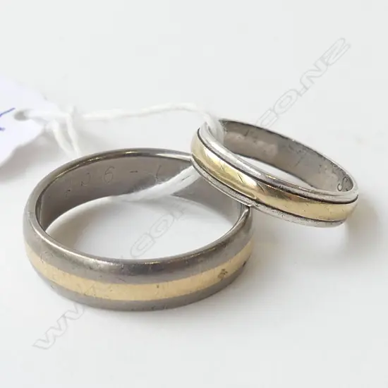 TWO SILVER ? RINGS WIH GOLD INLAY 6.27gms (size O & Y)