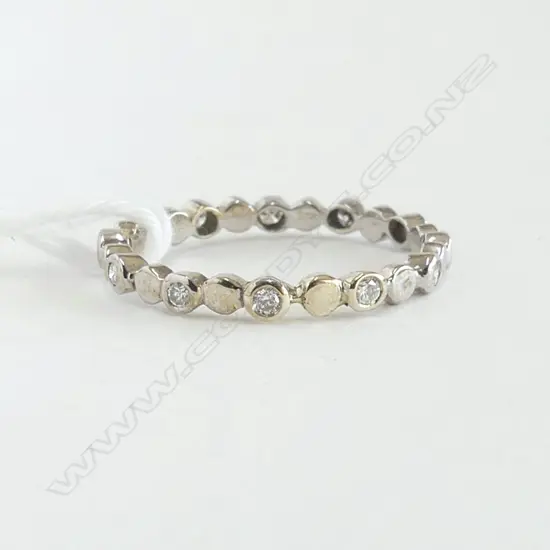 New old stock 9ct WHITE GOLD & DIAMOND STACKER RING 1.65gms. (RETAIL $850) SIZE O