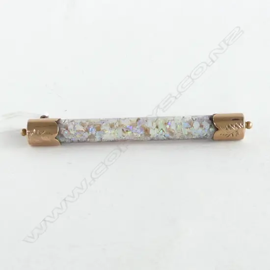 9CT TUBE BROOCH w. OPAL FLECKS L.60mm