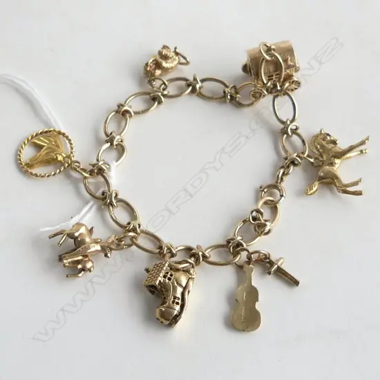 9CT CHARM BRACELET, 25gms