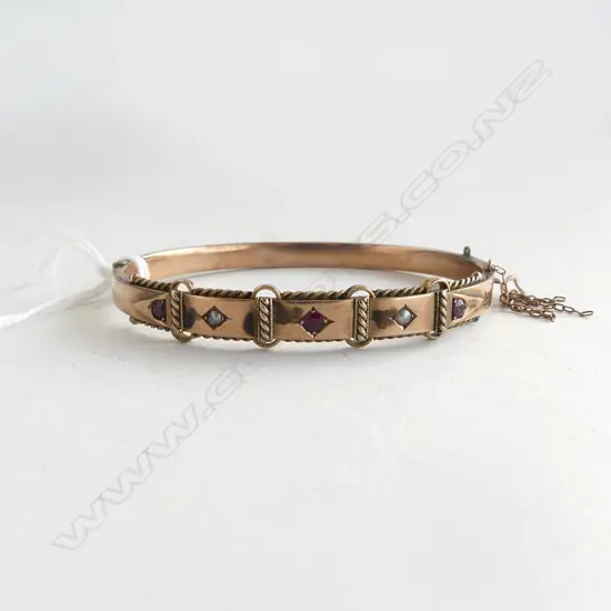 EDWARDIAN 9ct ROSE GOLD HALF HINGED SNAP BANGLE 8.6gms belt panelled form garnet set