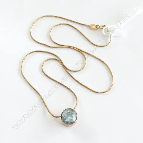 ROSE GOLD PENDANT WITH BLUE STONE ON FINE CHAIN