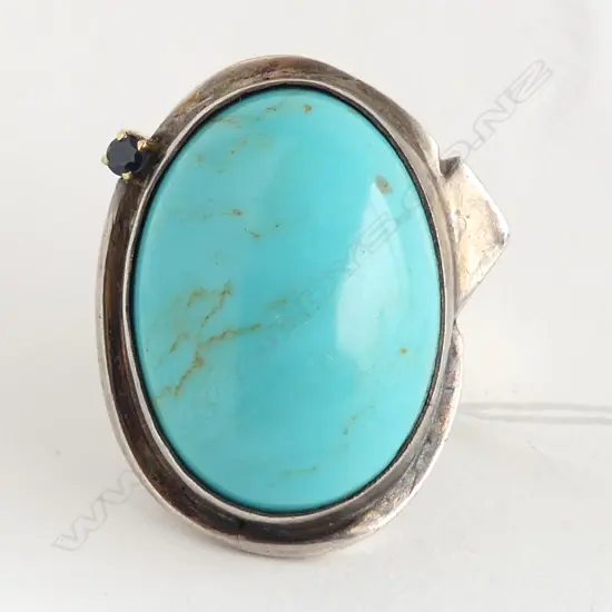 LG SILVER & TURQUOISE RING, UNMARKED 42.2gms 40x35mm SIZE U ?