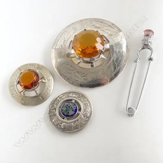 THREE SILVERPLATE SCOTTISH CAIRNGORM BROOCHES AND THISTLE KILT PIN