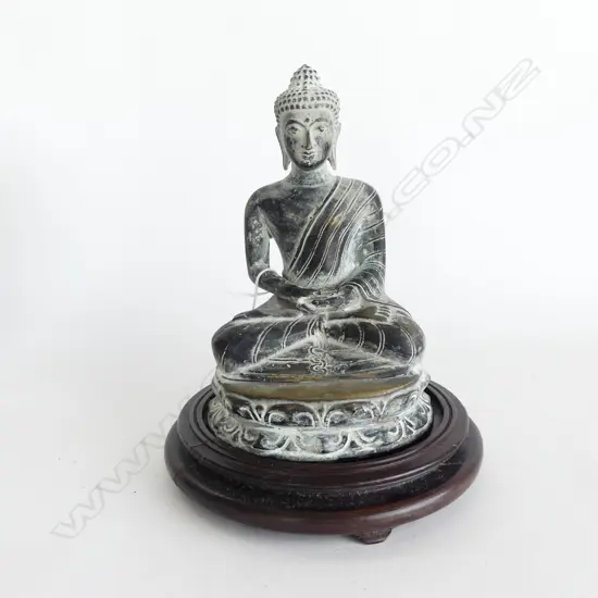 ORIENTAL BRASS BUDDHA ON CIRCULAR WOODEN STAND H.270mm