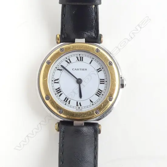LADIES CARTIER SANTOS WRISTWATCH silver gold & steel. Quartz movement leather strap