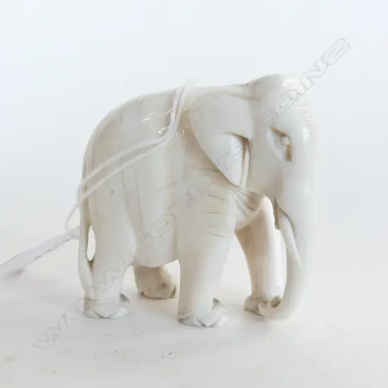 SMALL CARVED IVORY ELEPHANT H.53mm. 1 tusk absent