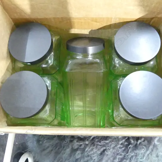 FIVE URANIUM GLASS JARS WITH BAKELITE LIDS, ONE LID AF H.200MM