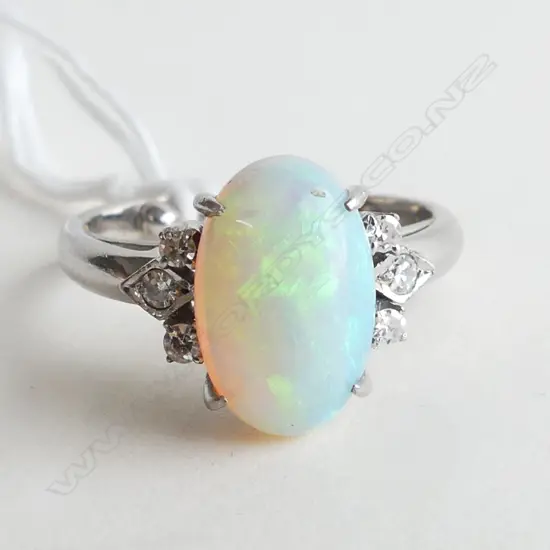 18ct WHITE GOLD CABACHON OPAL & 6 DIAMOND RING 3.63gms SIZE N ?