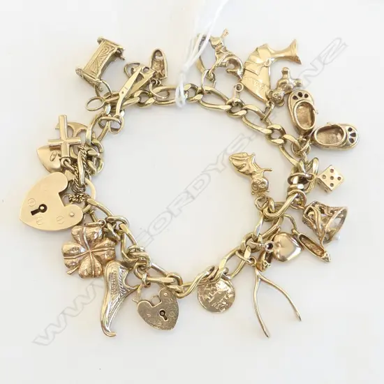 9ct YELLOW GOLD CHARM BRACELET, w 20 CHARMS, L.180mm, 31gms