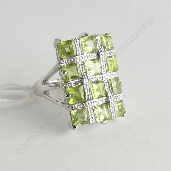 SILVER & PERIDOT RING (NEW)  size O to P