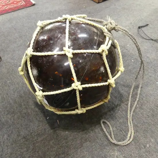OLD GLASS FISHING FLOAT w. NETTING APPROX 370mm DIA.