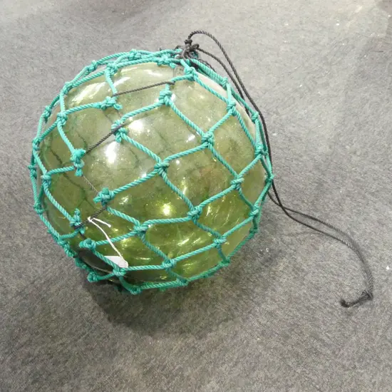 OLD GLASS FISHING FLOAT w. NETTING APPROX 370 mm DIA,. hand blown