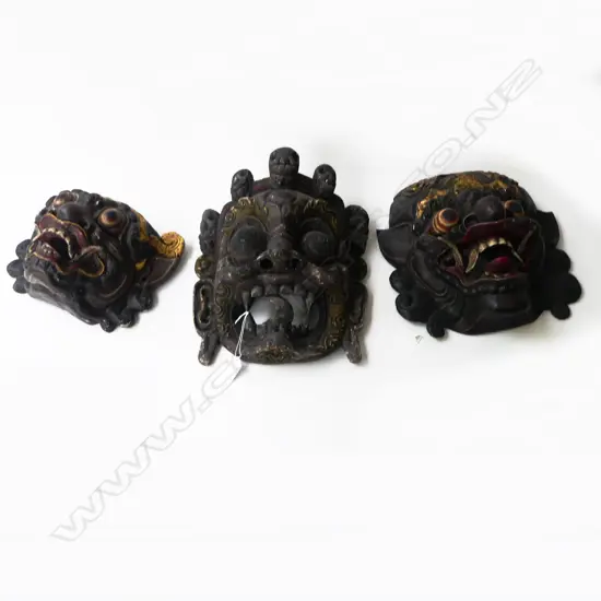 3 INDONESIAN CARVED WOODEN MASKS H.330mm