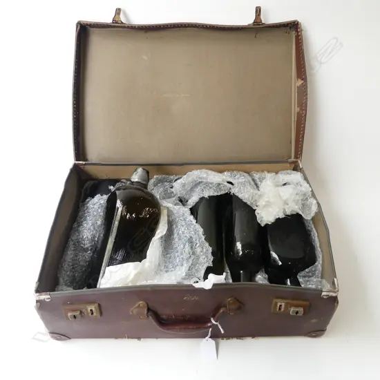 ASST. GREEN GLASS BOTTLES IN SUITCASE