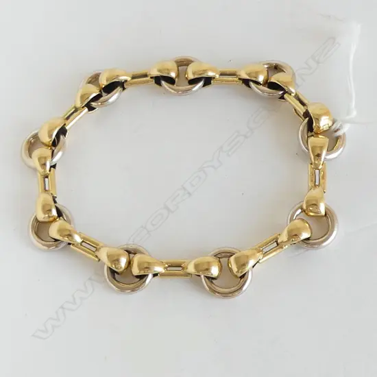 18CT YELLOW/WHITE GOLD DESIGNER BRACELET, 21.2gms