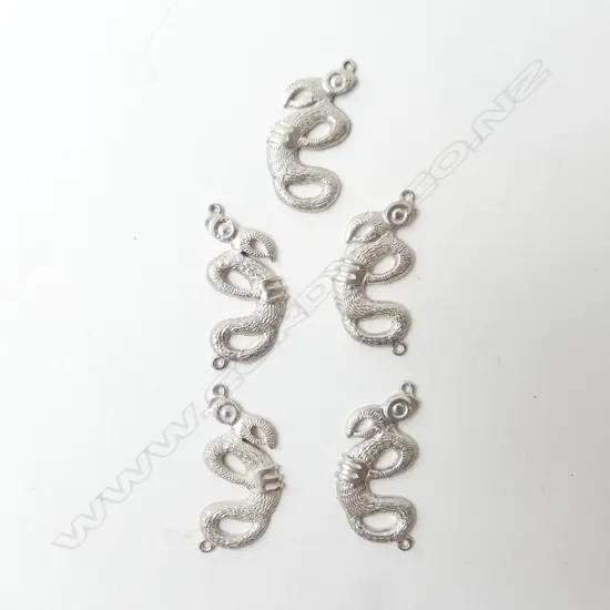 5 RUSSELL MURPHY SILVER TANIWHA CHARMS/SMALL PENDANTS