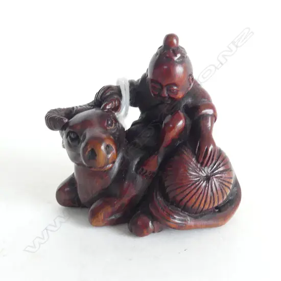 JAPANESE CARVED WOOD NETSUKE  MAN ON OX signed inlaid tablet