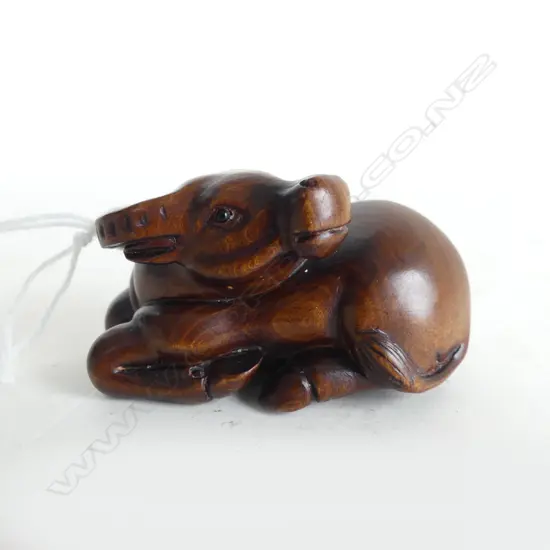 JAPANESE CARVED WOOD NETSUKE recumbent WATER BUFALLO head turning left
