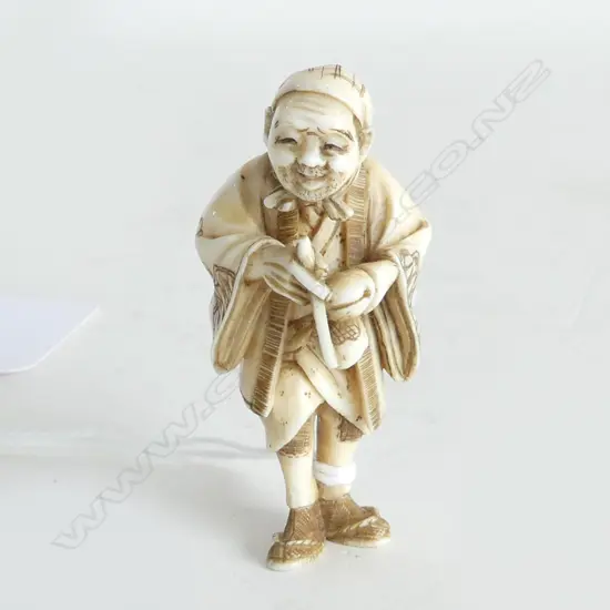 JAPANESE CARVED IVORY NETSUKE  MAN W PIPE