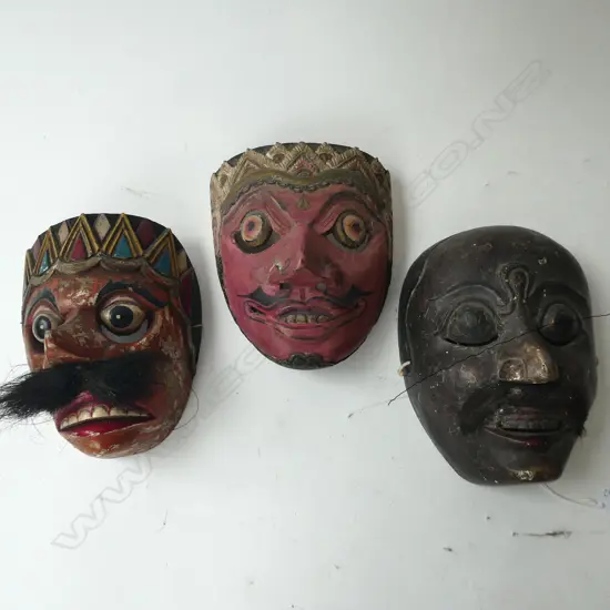 3 INDONESIAN CARVED WOODEN MASKS H.210mm 1 w. BORER