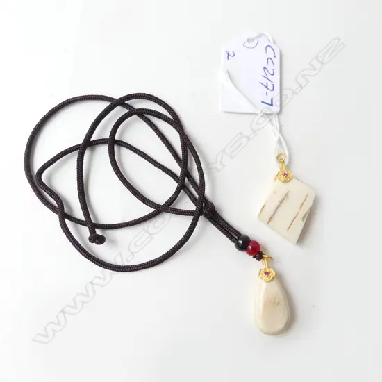 2 MAMMOTH TUSK IVORY CARVED SMALL PENDANTS