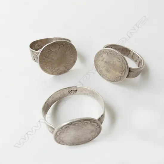 3 Middle eastern large silver coin napkin rings with various markings. 1 fitting loose 135gms