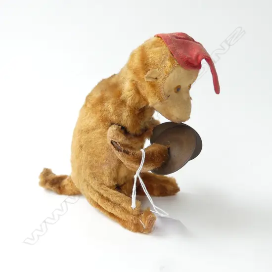 TIN TOY CLOCKWORK MUSICAL MONKEY (WORKING) H.155mm