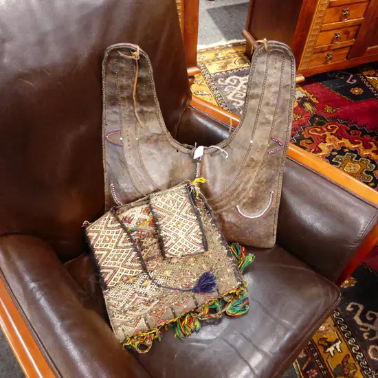 TWO ETHNIC SADDLE BAGS; ONE WOVEN w TASSLES, ONE BEADED LEATHER
