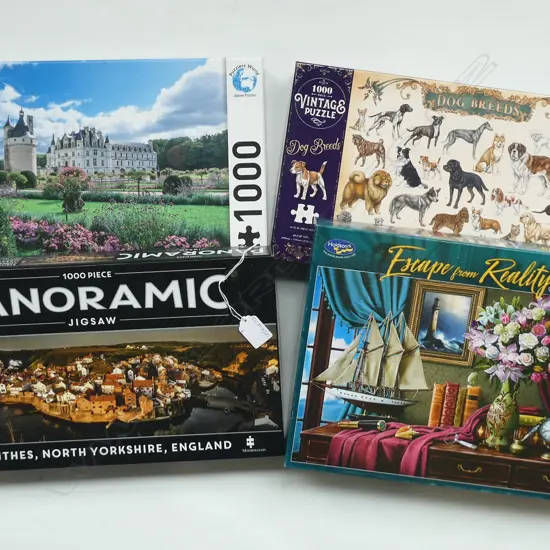 FOUR 1000PC JIGSAW PUZZELS – FRANCE, ENGLAND, EXPLORERS DESK, DOGS