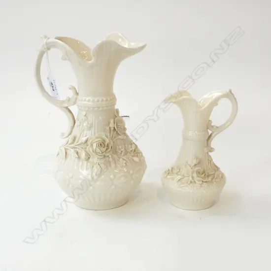 GRADUATED PR BELLEEK JUGS; Decorated w. roses in high relief, H.230mm