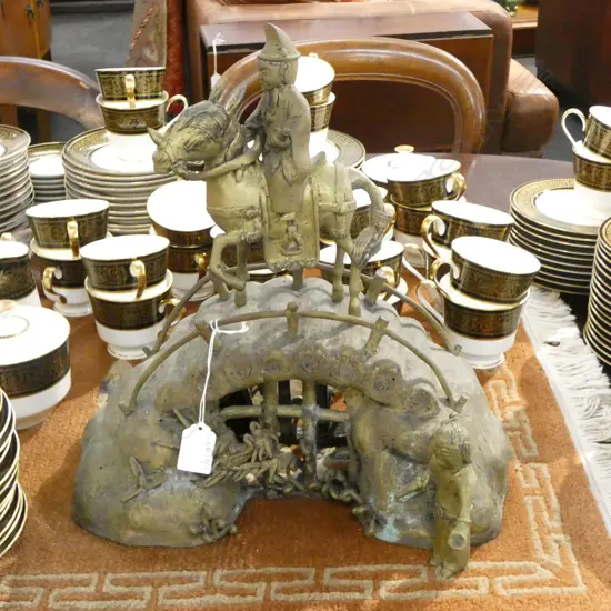 ORIENTAL BRASS FIGURE; HORSE RIDER ON BRIDGE H.360mm