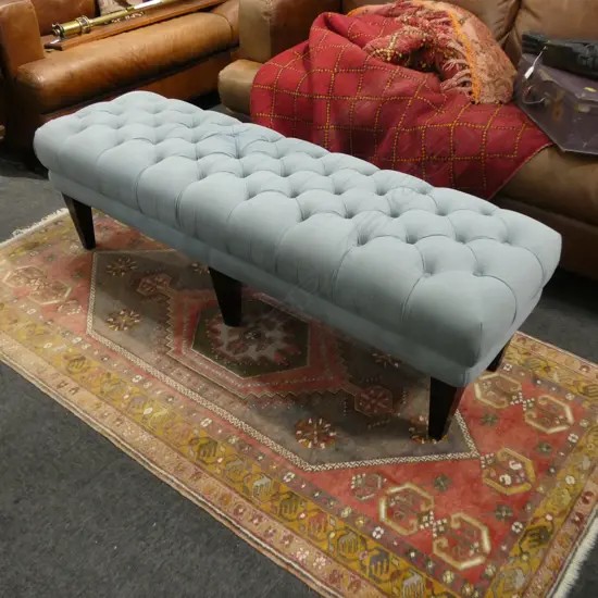 BLUE VELVET BUTTONED OTTOMAN