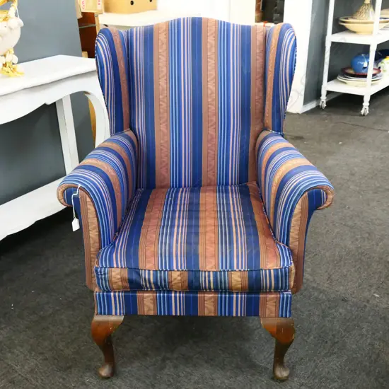 UPHOLSTERED WINGBACK ARMCHAIR