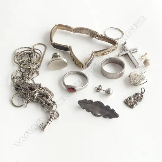 bag ASST SILVER JEWELLERY: small hei tiki + crucifix + rings + bracelet etc