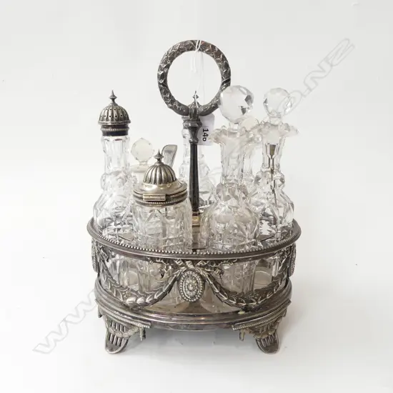 VICTORIAN SILVER PLATE SEVEN BOTTLE CRUET SET swag & laurel wreath decoration H.275mm