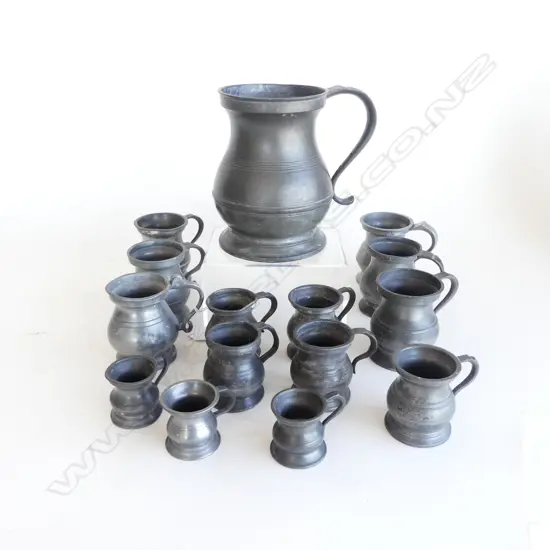 15 PEWTER BALUSTER JUGS; 1 QUART, 6 GILLS, 5 HALF, 3 SMALLER