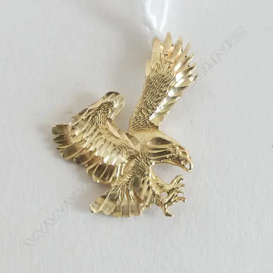 14ct YELLOW GOLD EAGLE ALIGHTING PENDANT 2.35gms