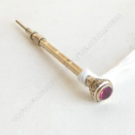 9CT GOLD PROPELLING PENCIL WITH RED STONE TOTAL WIEGHT 3.7GMS