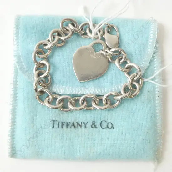 TIFFANY & CO. SILVER LINK BRACELET w. HEART CHARM & BAG, STAMPED,  (CD10691)