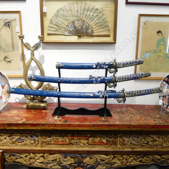 SET OF 3 JAPANESE REPRODUCTION SWORDS ON STAND; LARGEST L.1030mm