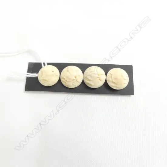 CARD OF 4 IVORY CARVED BUTTONS  L70MM