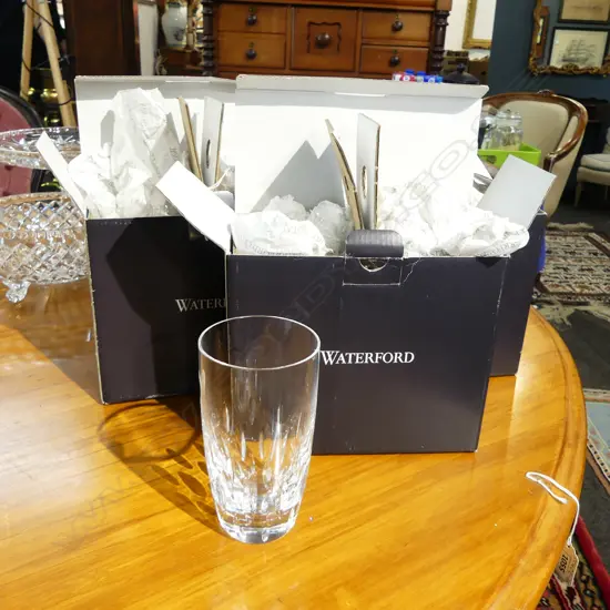 A set of eight Waterford crystal highball drinking glasses notch detail. H.135mm. Original boxes as new. Retail $687.