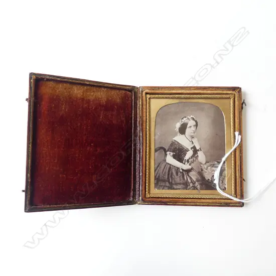EARLY PHOTOGRAPHIC PRINT YOUNG WOMAN. In glazed leather case