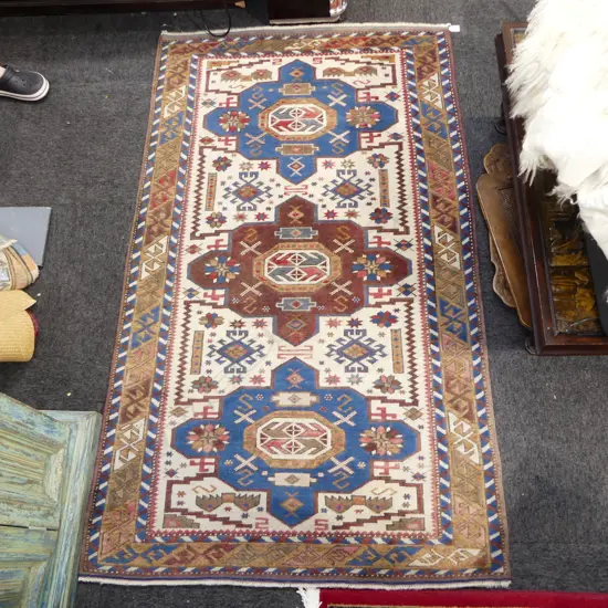 HAND KNOTTED WOOL PILE RUG