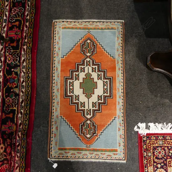 HAND KNOTTED ALL WOOL RUG 1100x590mm