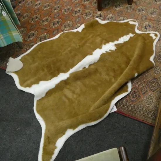 FAUX CALF SKIN RUG L1120MM