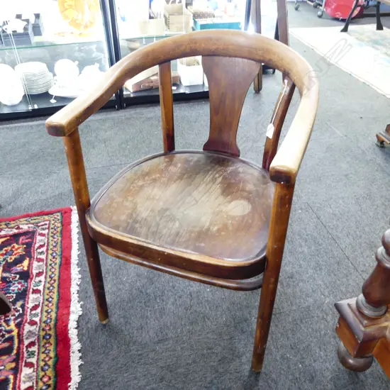 A BENTWOOD THONET ARMCHAIR